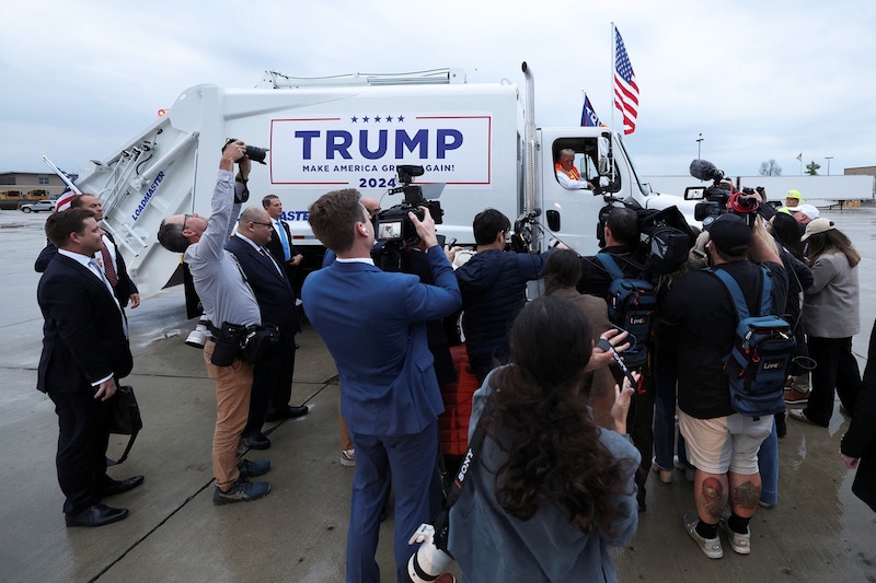Donald Trump boards a garbage truck to draw attention to Biden remark